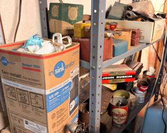 Garage shelving, InSinkErator, lamp parts, household items