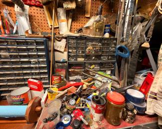 Workshop workbench, small parts organizer, hand tools, pegboard