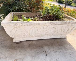 Large ornate concrete garden planter, scrollwork design
