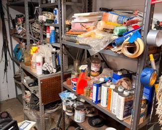 Metal garage shelving, paint cans, chemicals, household supplies