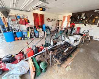 Garage overview, bicycle, ladder, gas cans, lawn equipment, tools