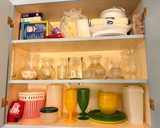 Vintage colored glassware, vases, serving pieces, kitchen cabinet