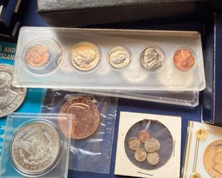 US coin proof set in holder with silver dollar and commemorative coins