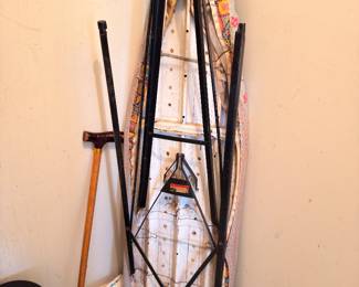 Ironing board, brooms, household items