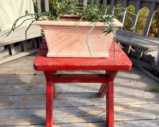 Red painted wooden plant stand bench, terracotta planter