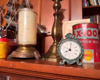 Vintage Shell X-100 Motor Oil can, antique alarm clock, brass lamp