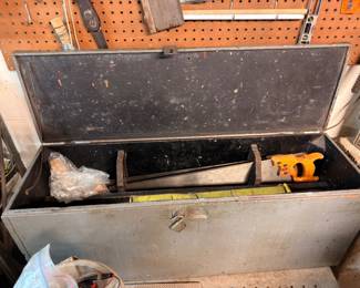 Vintage metal toolbox, open with hand tools