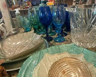 Assorted Colored Glassware, Leaf Pattern Serving Dishes, and Crystal Ice Bucket