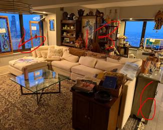 Modular "Cloud-Style" Sectional Sofa with Ottoman, Features a versatile, multi-piece configuration that can be rearranged to fit various room layouts,  Off-White / Ivory Performance Fabric $2,400