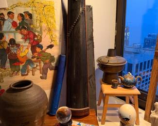 o Black & Brow Guzheng, alsknown as a Chinese zither, which is a traditional Chinese plucked string instrument $600 