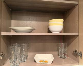 Glassware to the Left, Set of 5 for $55 , To the right smaller size set of 2 $30 | Set of 5 white and Yellow bowls $30
