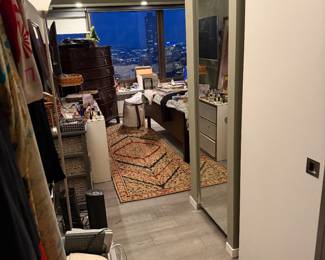 Traditional Persian-style runner featuring a dense floral medallion pattern in red, ivory, and dark blue $400 