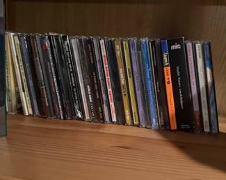 CD Assortment, featuring Muddy Waters -&nbsp;Live At Rockpalast, Mozart -&nbsp;Great Composers' Greatest Hits, Arlo Guthrie -&nbsp;In Times Like These, Carreras, Domingo, Pavarotti -&nbsp;Christmas, Songs for Japan, and more,  $60 bundle 