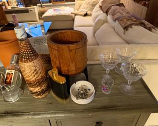 Set of 3 Etched Crystal Cocktail Cups $75.00, "Appleton" Basketweave Leather Bar Bottle (Decanter)$65.00, "Nepa" Fine Leather and Brass  Flask	$50.00, Wood Ice bucket $80   