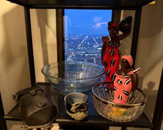 Sparkling ring Glass Bowl (back) $35| Caribbean Folk Art Figures Hand Carved & Painted Sculptures Tall $60, short $45 | Motif Glass bowl with Gold trim $45 | Small Ceramic Crab tea cup $25 | Vintage Metal Sconce: Dark, aged metal hanging sconce. $40.00 