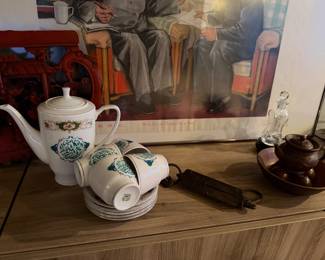 Calligraphy porcelain tea set  including tea pot 4 cuts and 5 saucer plates  $105