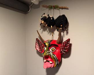 Mexican Diablo (devil) mask, a prominent example of traditional folk art often used in carnival celebrations or festivals  $290