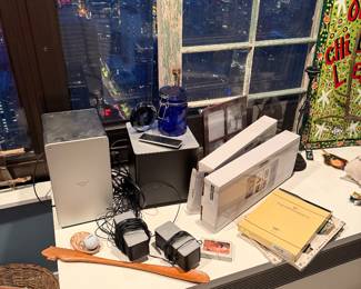 VIZIO 5.1 SmartCast Sound Bar System, Wireless Subwoofer: The large, vertical rectangular unit with a silver front and black sides, Satellite Speakers: Two smaller, rectangular rear surround speakers, Remote Control: slim, handheld,  $220, untested 