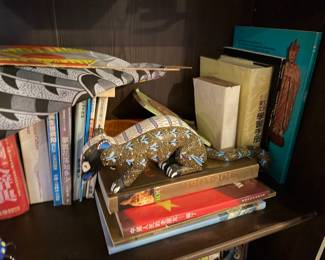 Hand-Painted "Iguana" Alebrije: An intricate Oaxacan-style folk art sculpture $145 | Assorted Books $30-50  