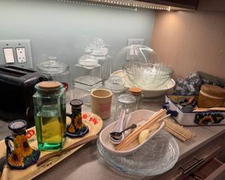 2-Slice Black Toaster $25 | Green Glass Infusion Jar $30 | Italian-Style Sunflower Cruet Set $45 | Clear Glass Cannister Collection $75 | Artisanal Textured Glass Platter $40 | Clear Glass Serving Bowls $30each |  Natural Bamboo Sushi Rolling Mat $20 | Floral Serving Tray $45 | Brown ceramic Jar $ 35   