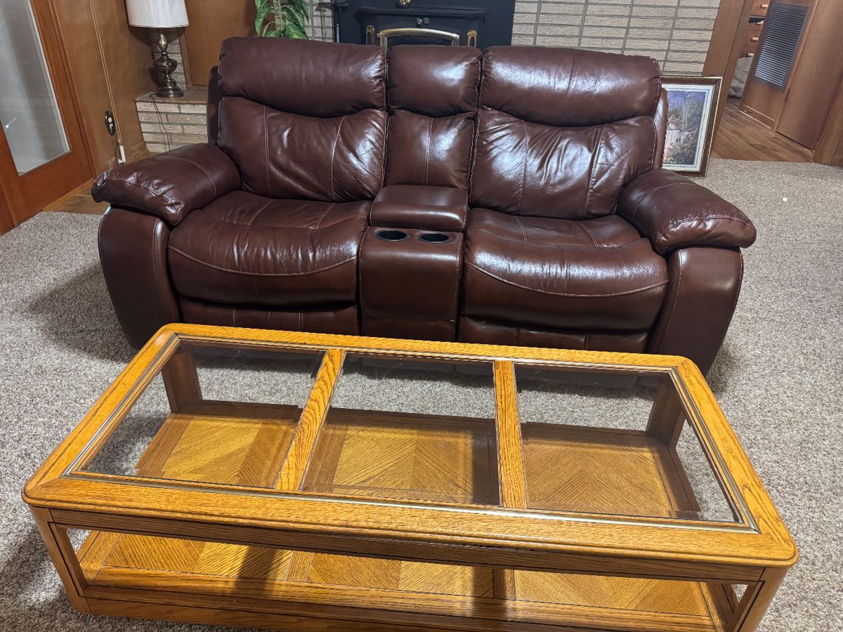Leather motion love seat 