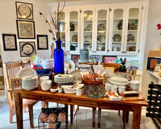 Breakfast room loaded full with Williams Sonoma, Mexican confetti glass, talavera style dishes, and more.