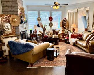 Relaxing den full of quality lady's hats and boots including Tecomas and Overland, flokatis, Hummels, and steins.