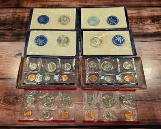 Uncirculated mint coin sets and Eisenhower silver dollars