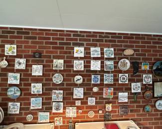 collection of hot plates/trivets from around the country