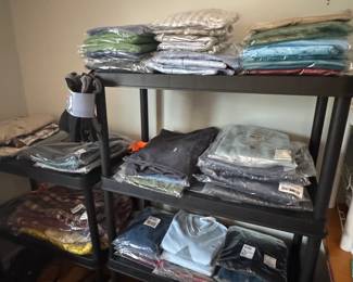 Clothes, new in the plastic bags they were delivered in