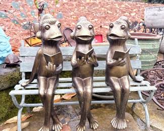 three holiday frogs seated on a bench metal figurine gardeners eden