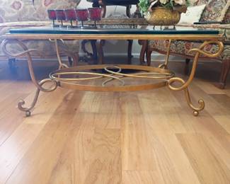 Glass top coffee table, gold brass scrollwork metal base, Hollywood Regency style, ornate wrought iron living room furniture, vintage