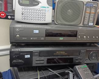Electronics lot: Sony VCR, GE DVD player, Midland crank radio, Casio label maker