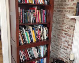 Dark wood bookcase shelf, book collection lot, tall bookshelf, traditional furniture, exposed brick