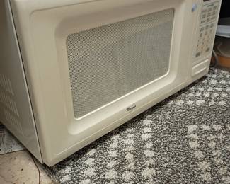 White microwave oven, countertop kitchen appliance, digital display, small microwave, household electronics