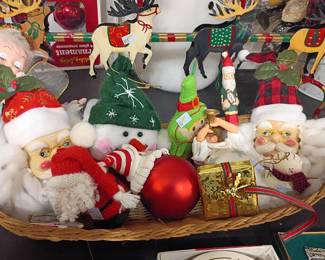 Christmas decorations lot, Santa figurines ornaments elf reindeer, holiday collectibles basket, festive decor assortment