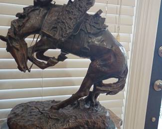 Bronze Remington-style bucking bronco horse sculpture
