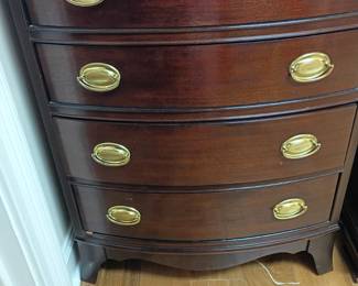 Mahogany bow-front chest of drawers, brass oval hardware, Federal style