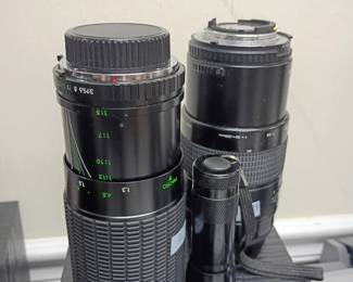 Vintage camera lenses lot, telephoto zoom lens, SLR DSLR photography equipment, black camera lens collection, photography gear accessories