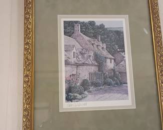 Framed country cottage watercolor print, gold ornate frame, matted artwork, stone building landscape scene, vintage wall art decor