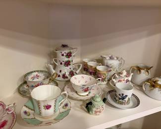 Porcelain china tea cups/saucers, tea pots and cream & sugar 