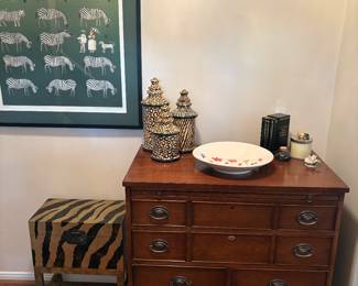 Another view of the chest with writers desk in drawer one, Zebra lithograph and side chest table, Zebra canister set and Michael Aram candle 