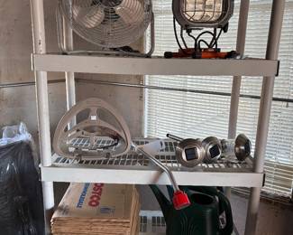 Plastic shelving, lanterns, fans, portable task light, watercans and paper "spring" clean-up  bags