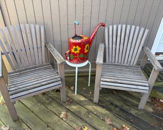 Pair of patio chairs, side table and watering can
