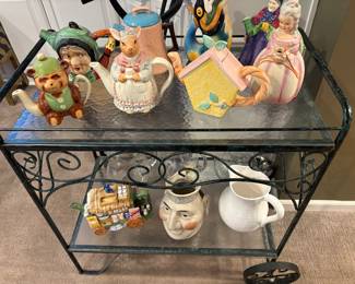 Bar cart with vintage tea pots and pitchers