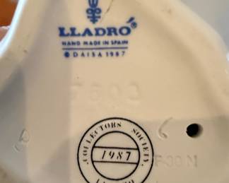 Lladro "Innocence in Bloom" Figurine (7644) and Lladro "Girl with Basket" Figurine (5027)