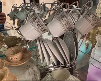 Vintage Porcelain Teacup and Saucer Set with Metal Rack third image