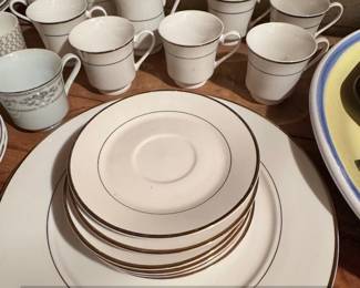 White Porcelain Teacup and Saucer Set with Gold Trim