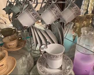 Vintage Porcelain Teacup and Saucer Set with Metal Rack