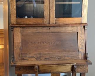 Antique Oak Secretary Desk with a Bookcase Hutch 32 L x 21.5D x 73 H. Matching Oak Chair.